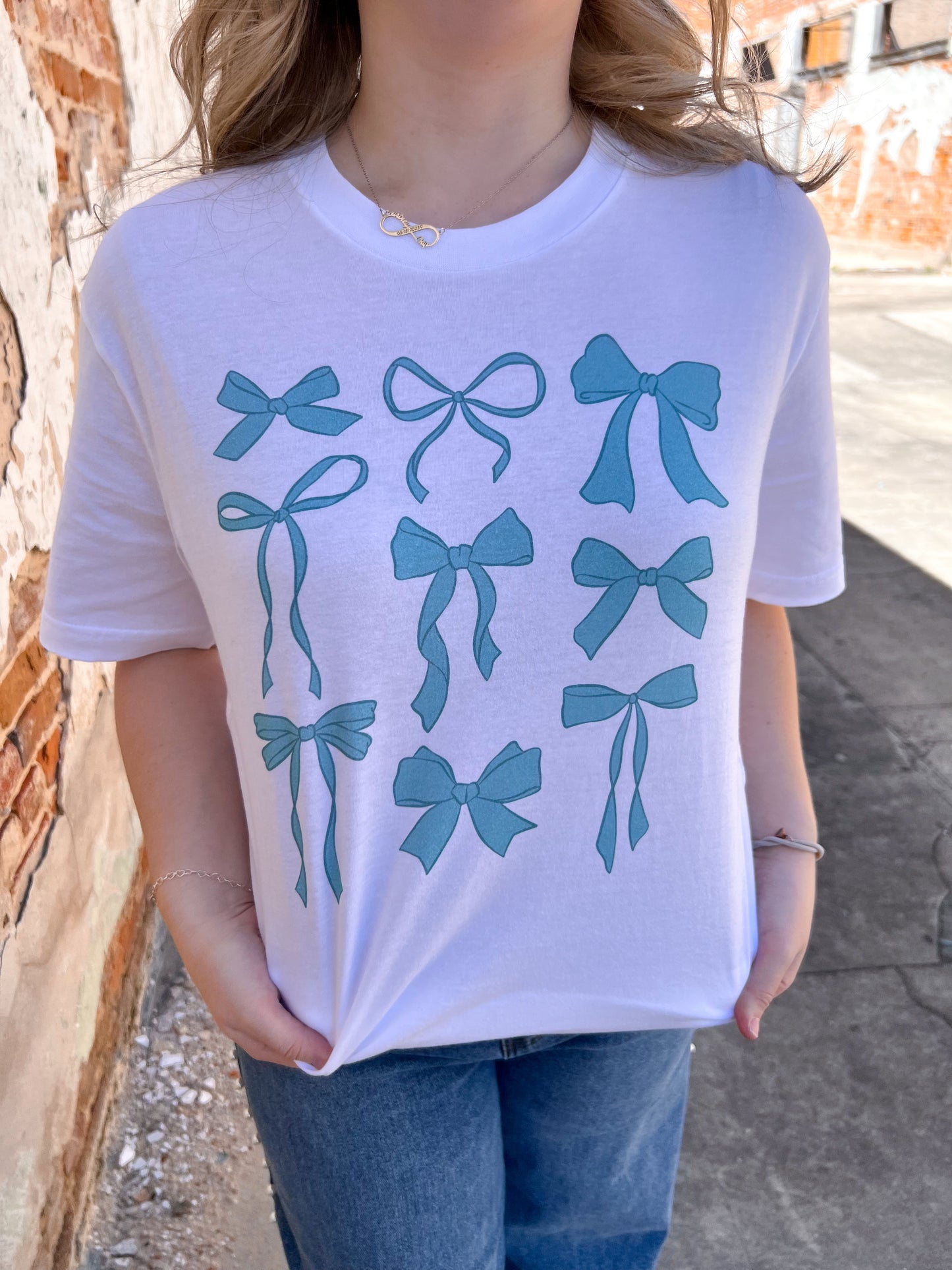 Blue Bow Graphic Tee-Apparel & Accessories-Bling-A-Gogo-08/18/24,11/11/24,1st md,OGP 34.99,Tops Collection-The Twisted Chandelier