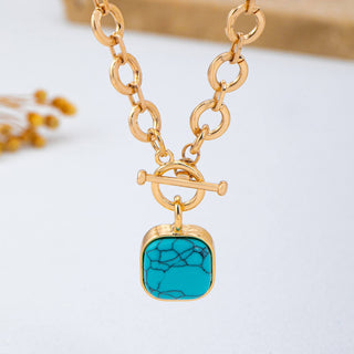 Turquoise-Tone Medallion Toggle Necklace-Necklace-JOSSLYN by wall to wall-80N93042-The Twisted Chandelier