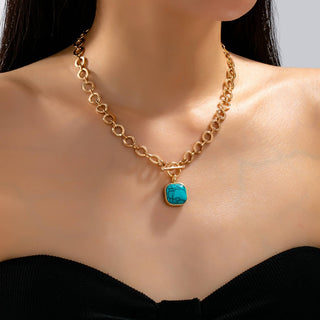 Turquoise-Tone Medallion Toggle Necklace-Necklace-JOSSLYN by wall to wall-80N93042-The Twisted Chandelier