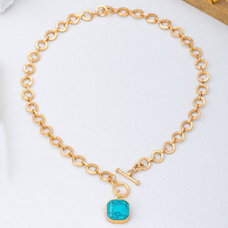 Turquoise-Tone Medallion Toggle Necklace-Necklace-JOSSLYN by wall to wall-80N93042-The Twisted Chandelier